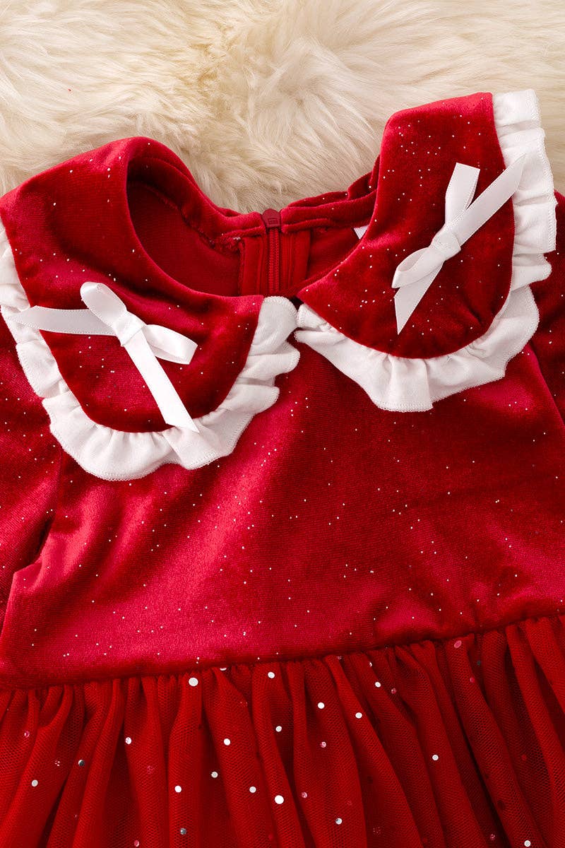 Shimmery red dress with fancy velvety fabric.: