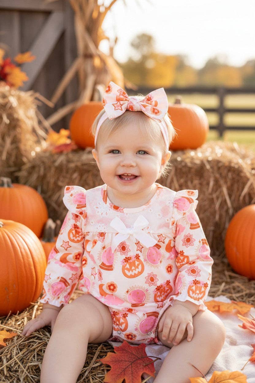 Mad pumpkin printed bubble baby bodysuit with embroidery.