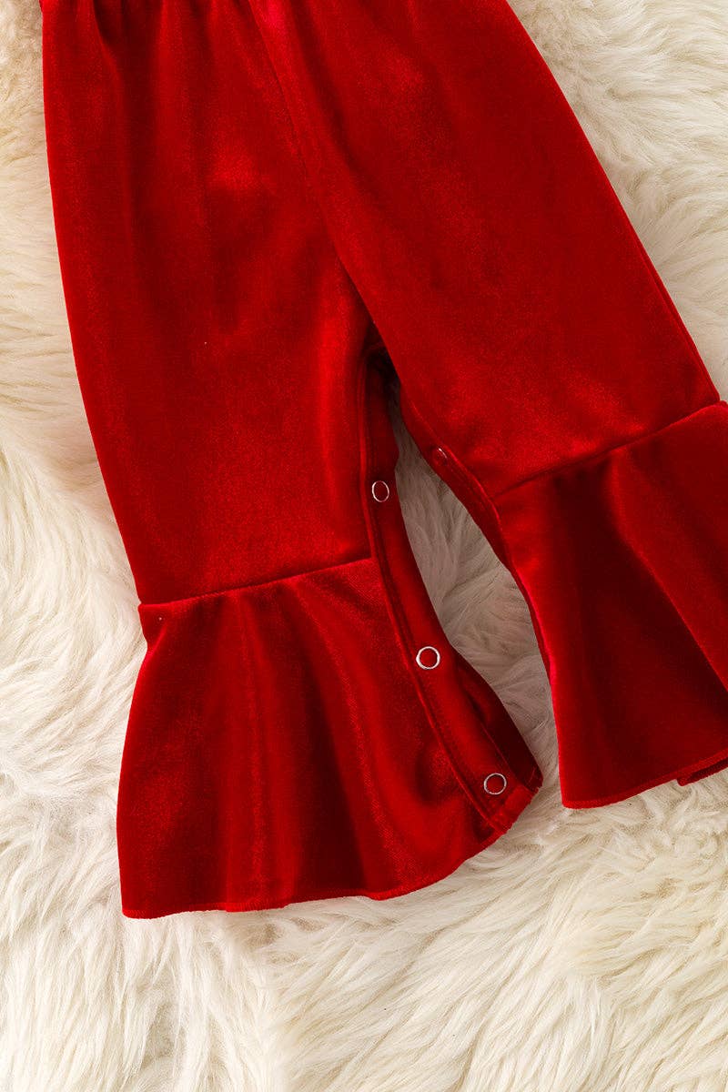 Red Velvety baby romper with snaps.