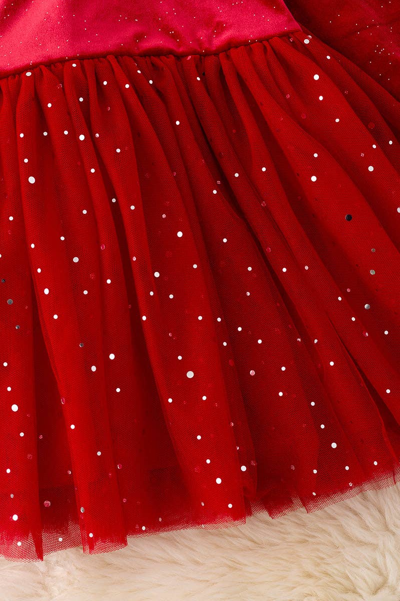 Shimmery red dress with fancy velvety fabric.: