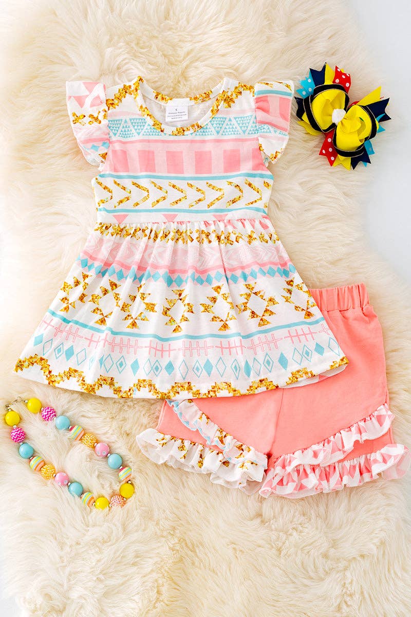 Geometric printed tunic & ruffle shorts.