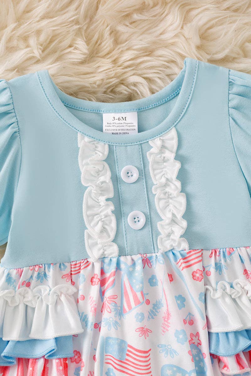 Baby blue multi-printed patriotic baby romper.