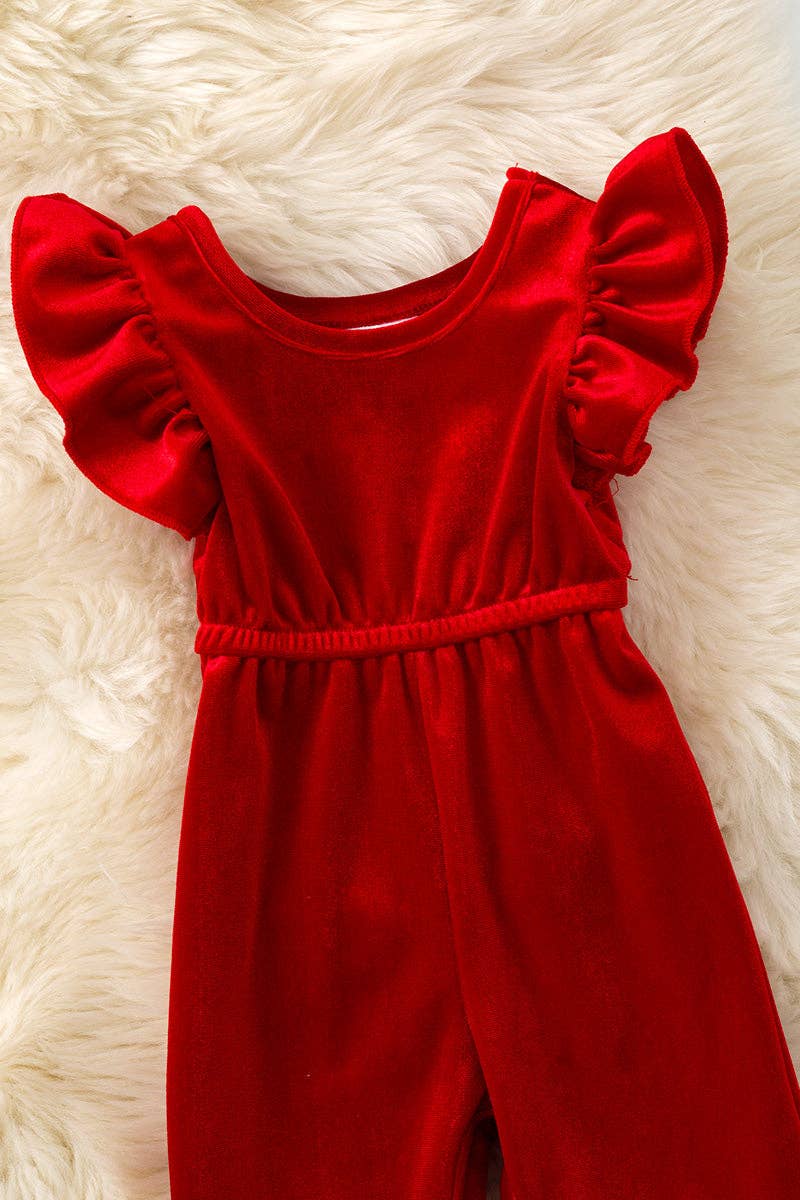 Red Velvety baby romper with snaps.