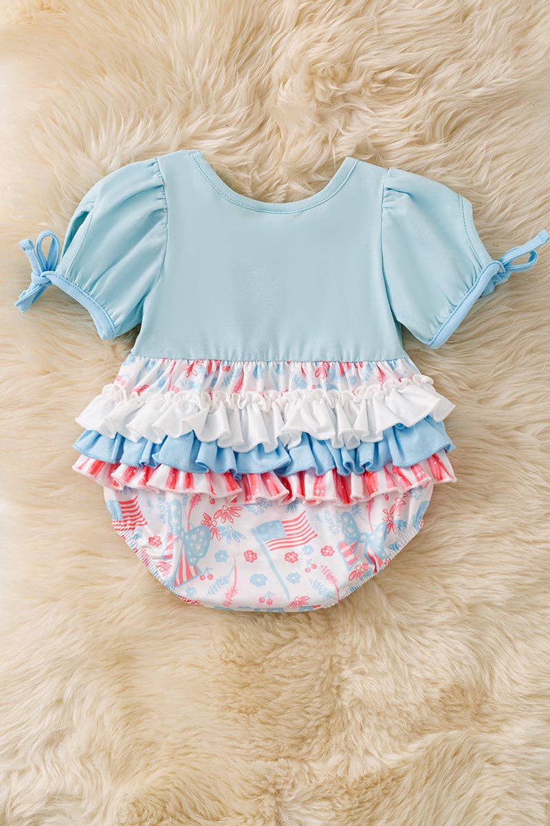 Baby blue multi-printed patriotic baby romper.