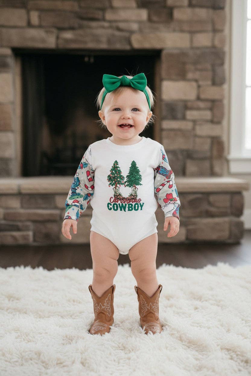 Christmas cowboy printed baby onesie with snaps.