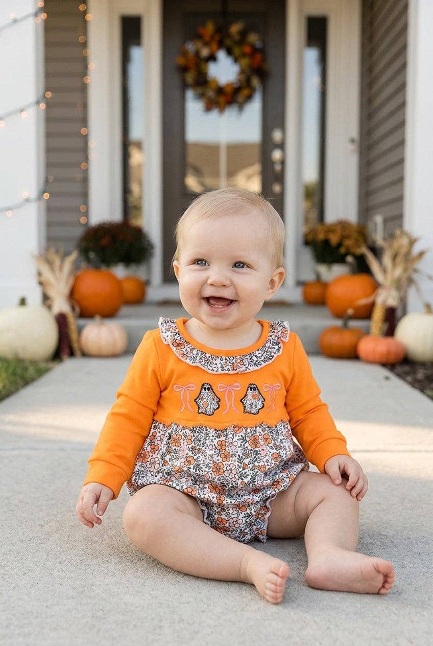 Floral ghost applique on orange baby romper