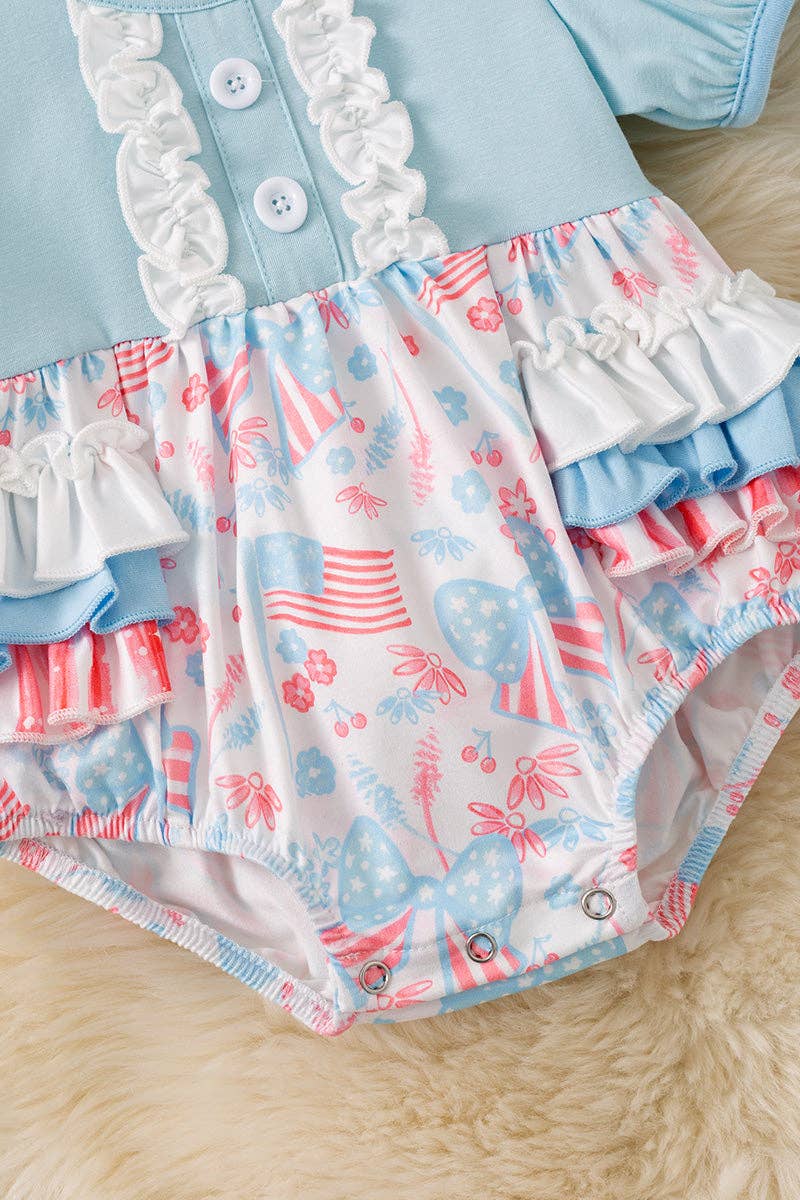 Baby blue multi-printed patriotic baby romper.